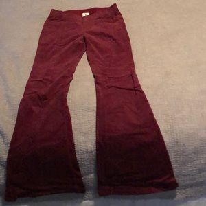 Crimson corduroy dramatic flare pants